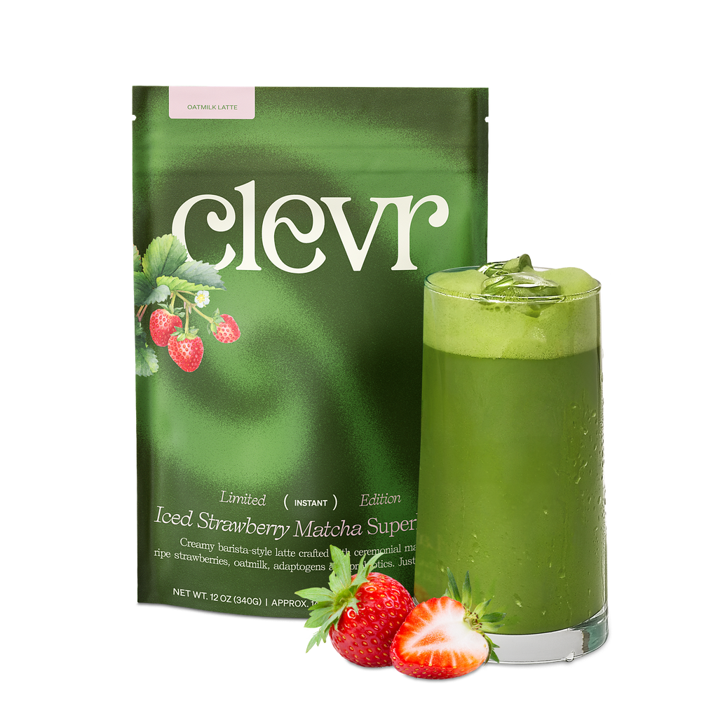 Clevr iced strawberry matcha superfood package with a glass of matcha and strawberries